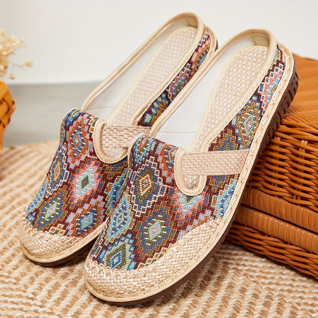 Women's printed slip-on mules with soft, lightweight soles.