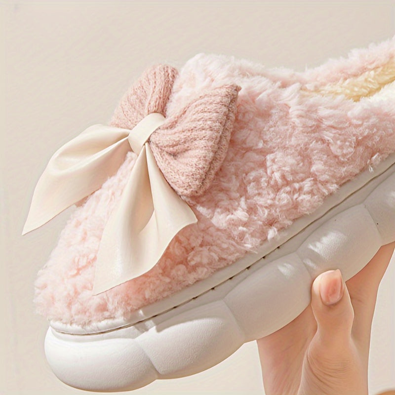 Women's winter warm plush slippers with bowknot detail and non-slip sole, perfect for autumn/winter indoor wear.