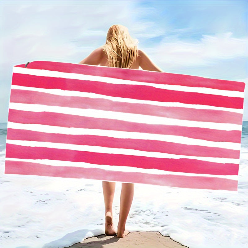 Oversized striped beach towel perfect for adventures. Made of super soft microfiber, quick-dry, sand-free, and ideal for various activities. Available in tropical blue & white. Comes in two sizes and is lightweight and absorbent.