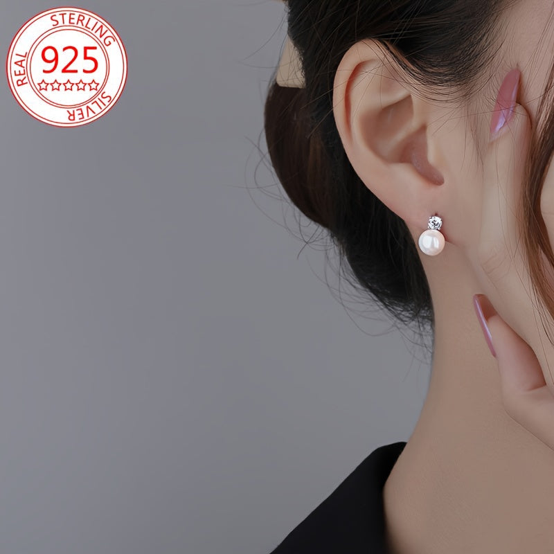 Add a touch of elegance with these stunning 925 Sterling Silver Stud Earrings featuring Sparkling Moissanite and Freshwater Imitation Pearl. This Hypoallergenic Luxury Vintage Style Jewelry is perfect for women, ideal for gifting and special occasions.