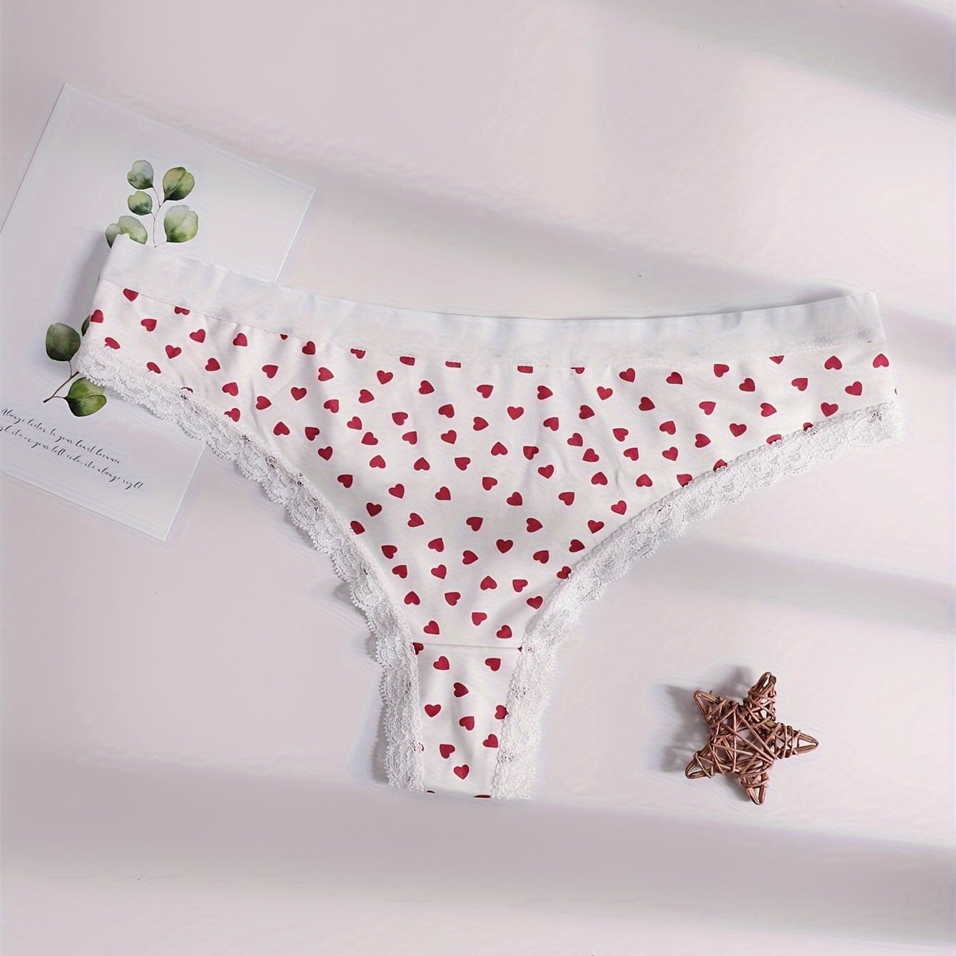 Heart print thongs with low waist lace, sexy women's underwear.