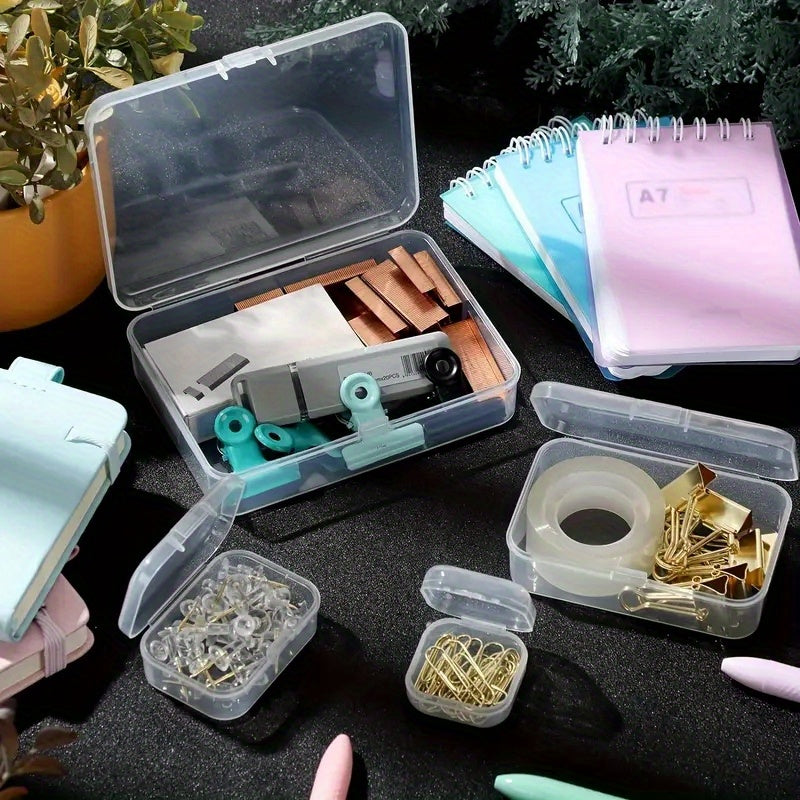 Clear plastic storage boxes with hinged lids in assorted sizes for organizing jewelry, beads, office supplies, and games.