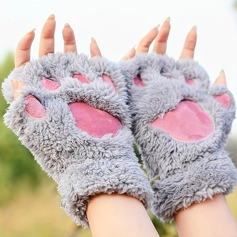 Stylish and cozy, these Cute Cat Claw Plush Gloves provide warmth and comfort in the cold seasons. The half finger design adds a trendy touch to these thick, fuzzy gloves, making them perfect for autumn and winter.