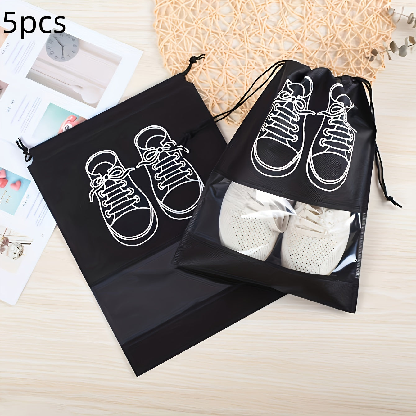 5 Portable shoe storage bags with drawstring made of waterproof, non-woven fabric for travel and closet organization.