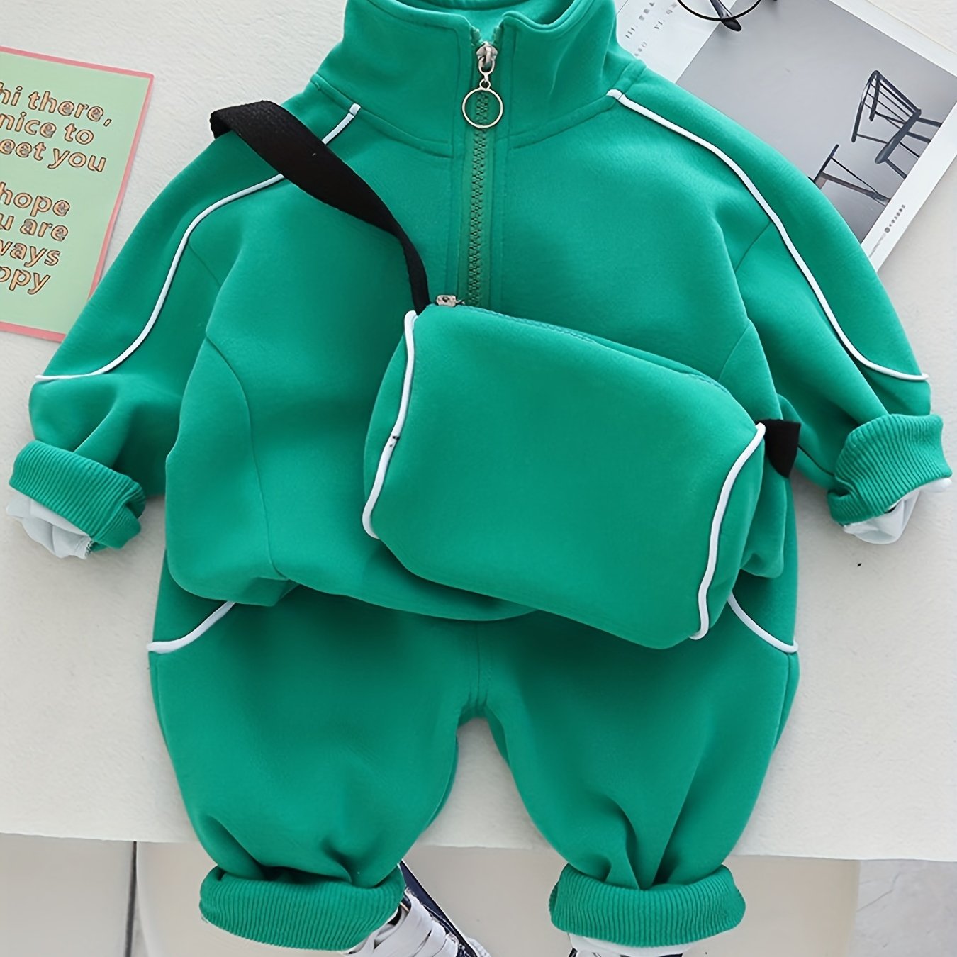 Trendy boys' sports casual outfits with zip-up stand collar sweatshirt and pants set, including a free satchel bag. Perfect for outdoor activities.