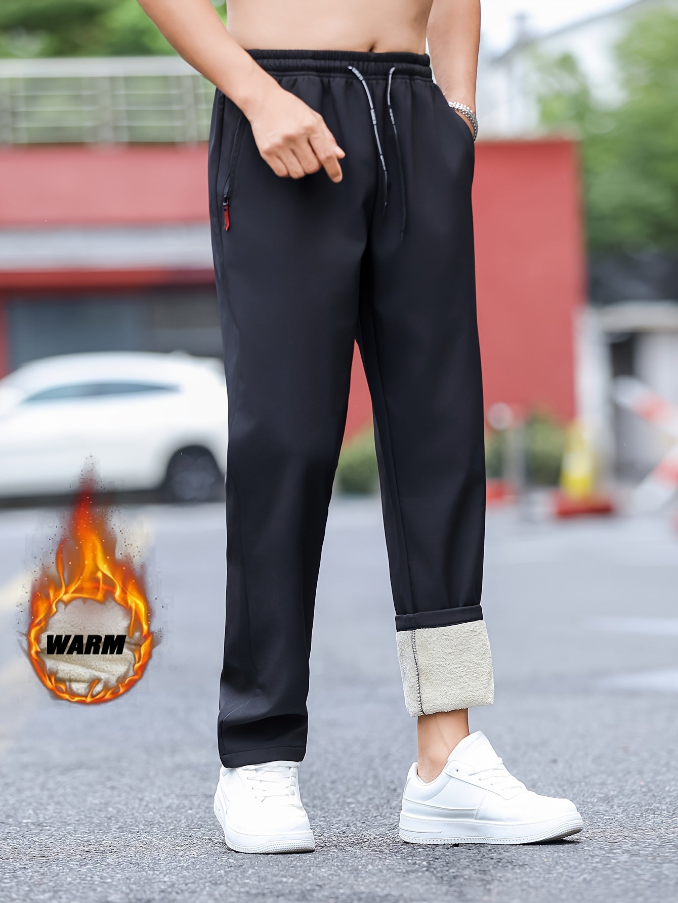 Men's winter fleece-lined casual pants made of solid color 100% polyester with a regular fit and zipper detail.