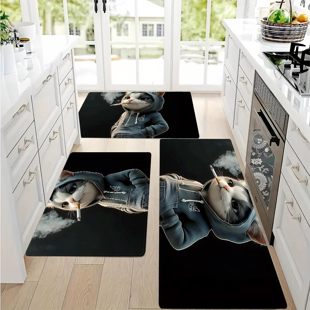 Small, machine washable doormat featuring a whimsical cat in a hoodie design. Made of durable polyester, this quick-dry mat is ideal for kitchen, bathroom, bedroom, and outdoor decor.