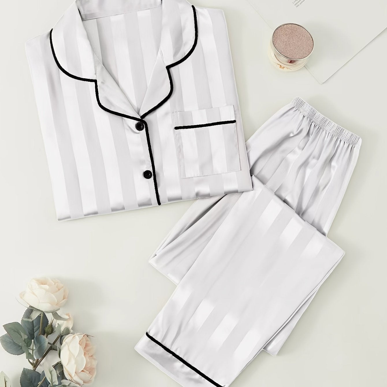 Women's satin pajama set with striped long sleeve top and lounge pants for sleepwear and loungewear.