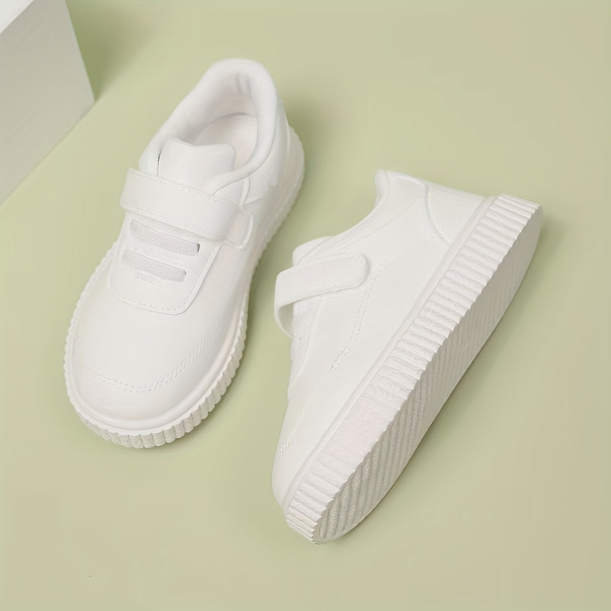 Kids White Sneakers - Lightweight sports shoes with Bullock detail, stylish and versatile for boys and girls under 14.