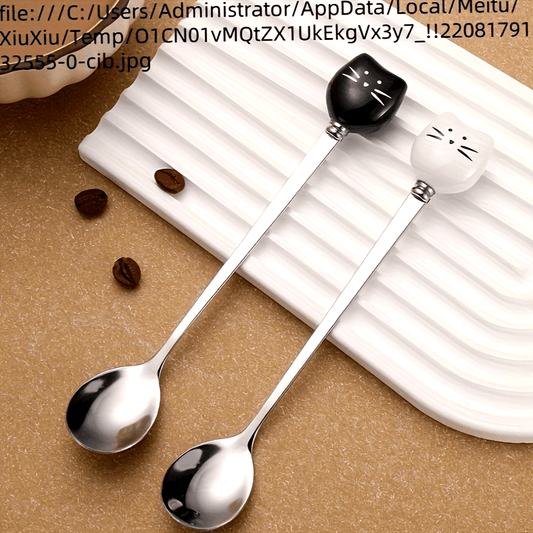 Charming stainless steel coffee stirrers with whimsical ceramic kitty spoons.