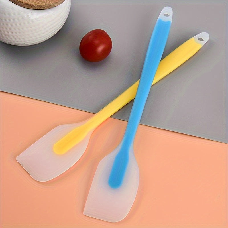 Versatile silicone scraper set includes two sizes for baking, made of durable and heat-resistant material, available in a variety of colors.