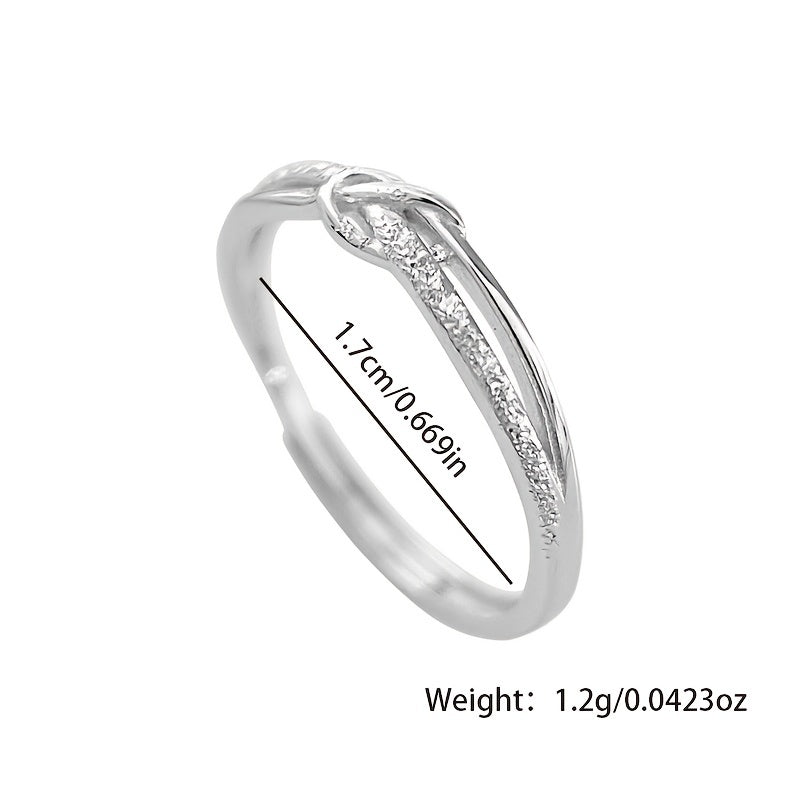 Women's adjustable sterling silver ring with starry knot rope design. Simple and frosted with a hollow plain opening. Hypoallergenic and lightweight, weighing approximately 1.2g.