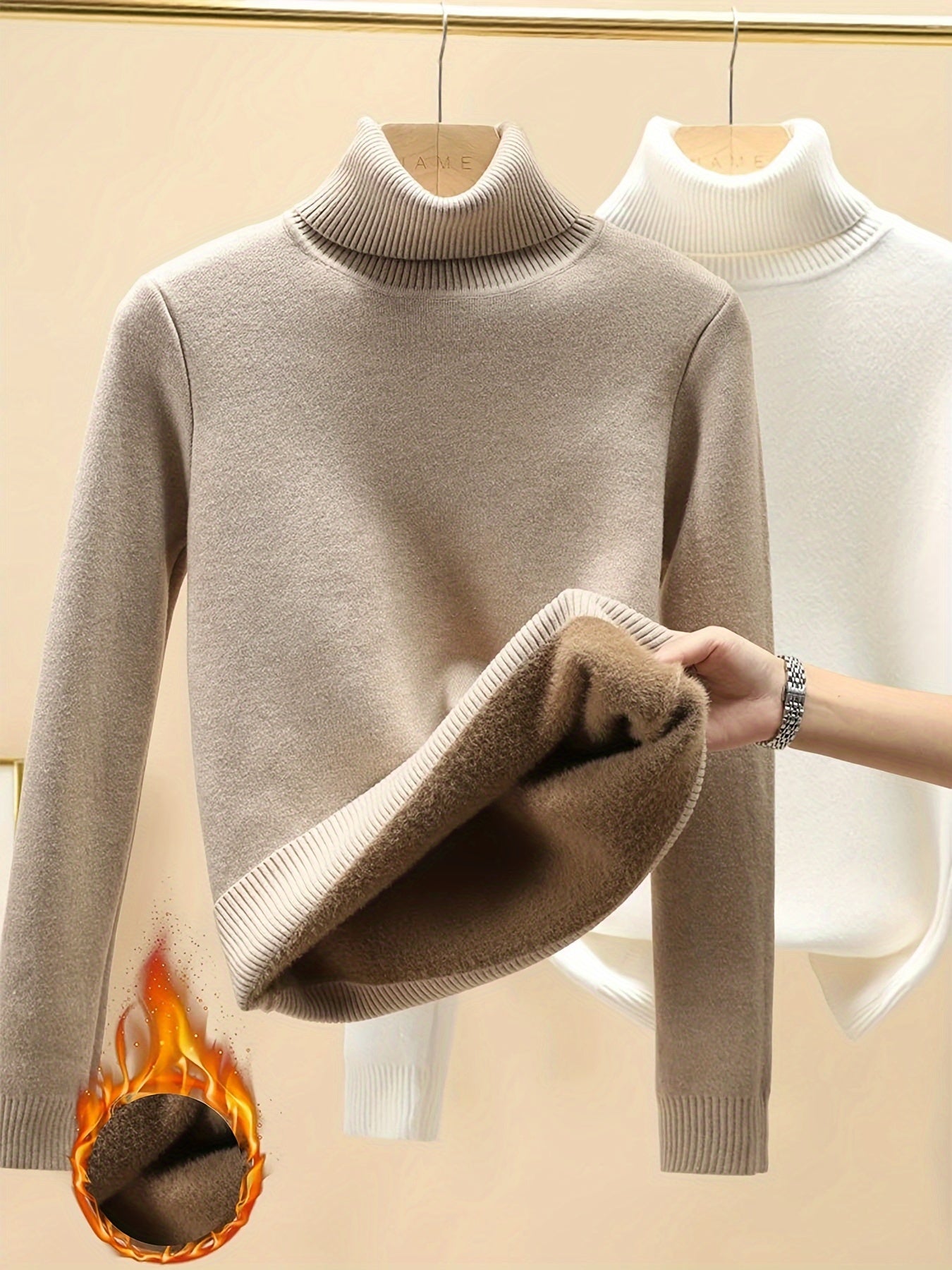 High-neck thick fleece sweater for women, perfect for winter. Made of polyamide, viscose, and polyester blend. Solid color design, 529g/m² fabric weight. A must-have for fall/winter.