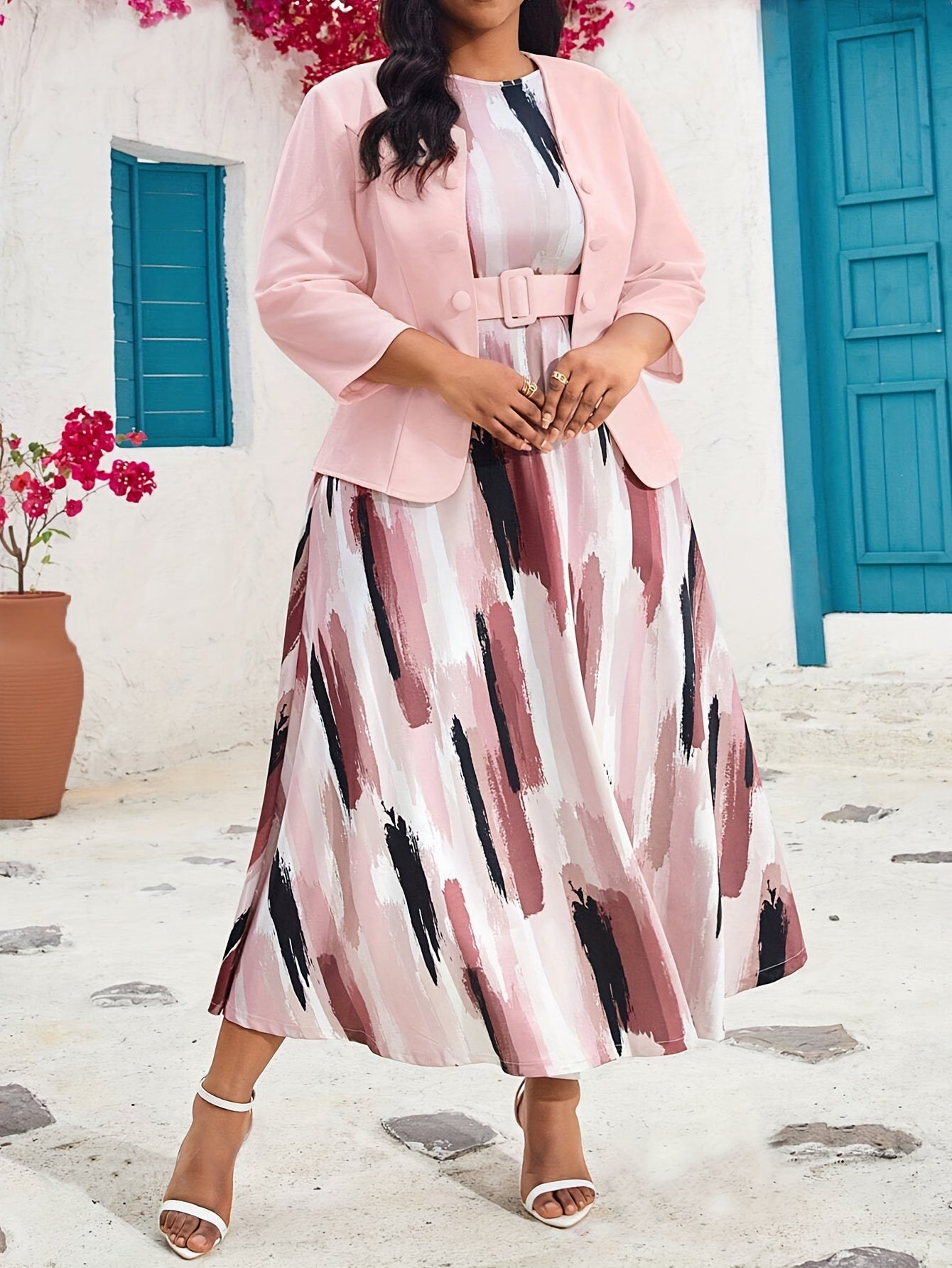 Stylish pink coat and vest dress set for plus-size women that enhances the figure.