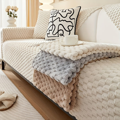 Non-slip sofa cover with honeycomb pattern, ideal for all seasons and protecting furniture in any room.