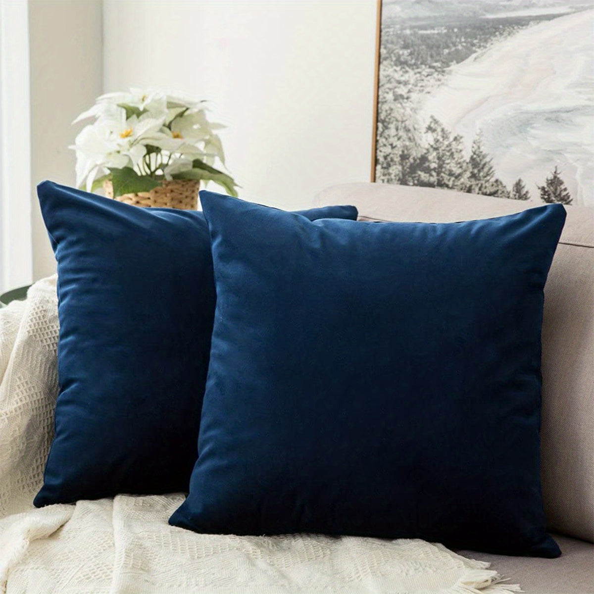 Luxurious dark blue chenille throw pillow cover with contemporary style and stain-resistant features. Made of 100% polyester with a zippered closure. Hand wash only for cozy living room decor.