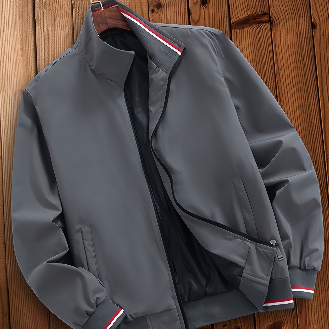 Men's casual striped jacket with pockets, stand collar, zipper closure, and long sleeves, suitable for outdoor wear.