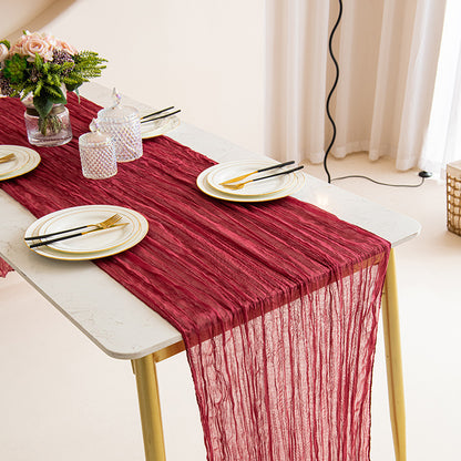 Boho cheesecloth table runner for various occasions and home decor.