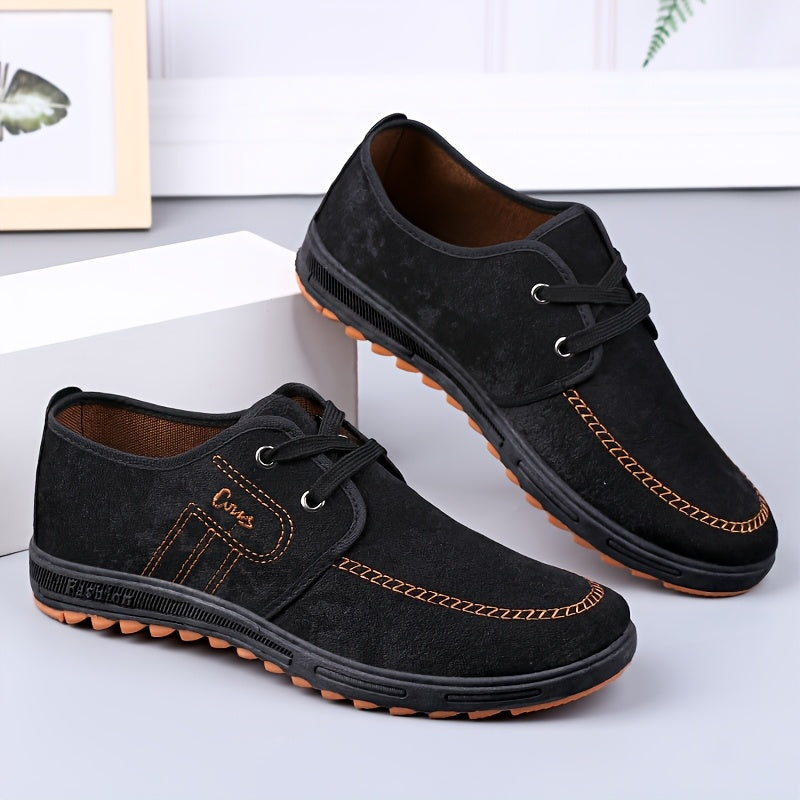 Comfortable men's slip-on canvas shoes in solid colors, ideal for outdoor activities.