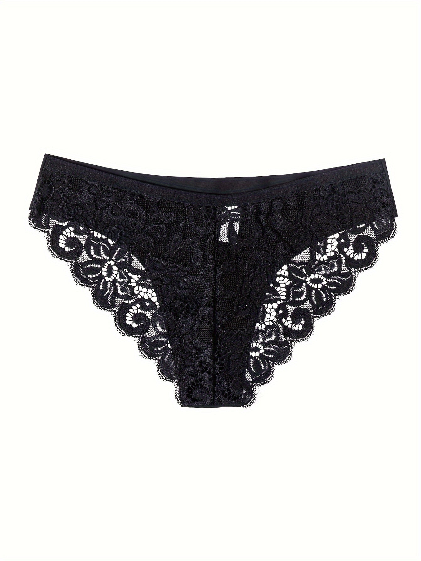 Women's black lace panties with low-rise, seamless design. Made from soft nylon/elastane blend with scalloped trim and cut-out detail. Hand washable. Elegant solid color underwear for