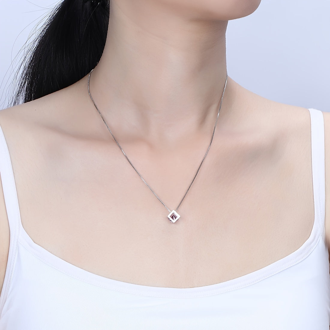 Necklace crafted from 925 Sterling Silver with a 3D Cube Crystal Pendant and Cubic Zirconia accents. Perfect for women, this piece of jewelry exudes elegance and style in a stunning silvery hue.