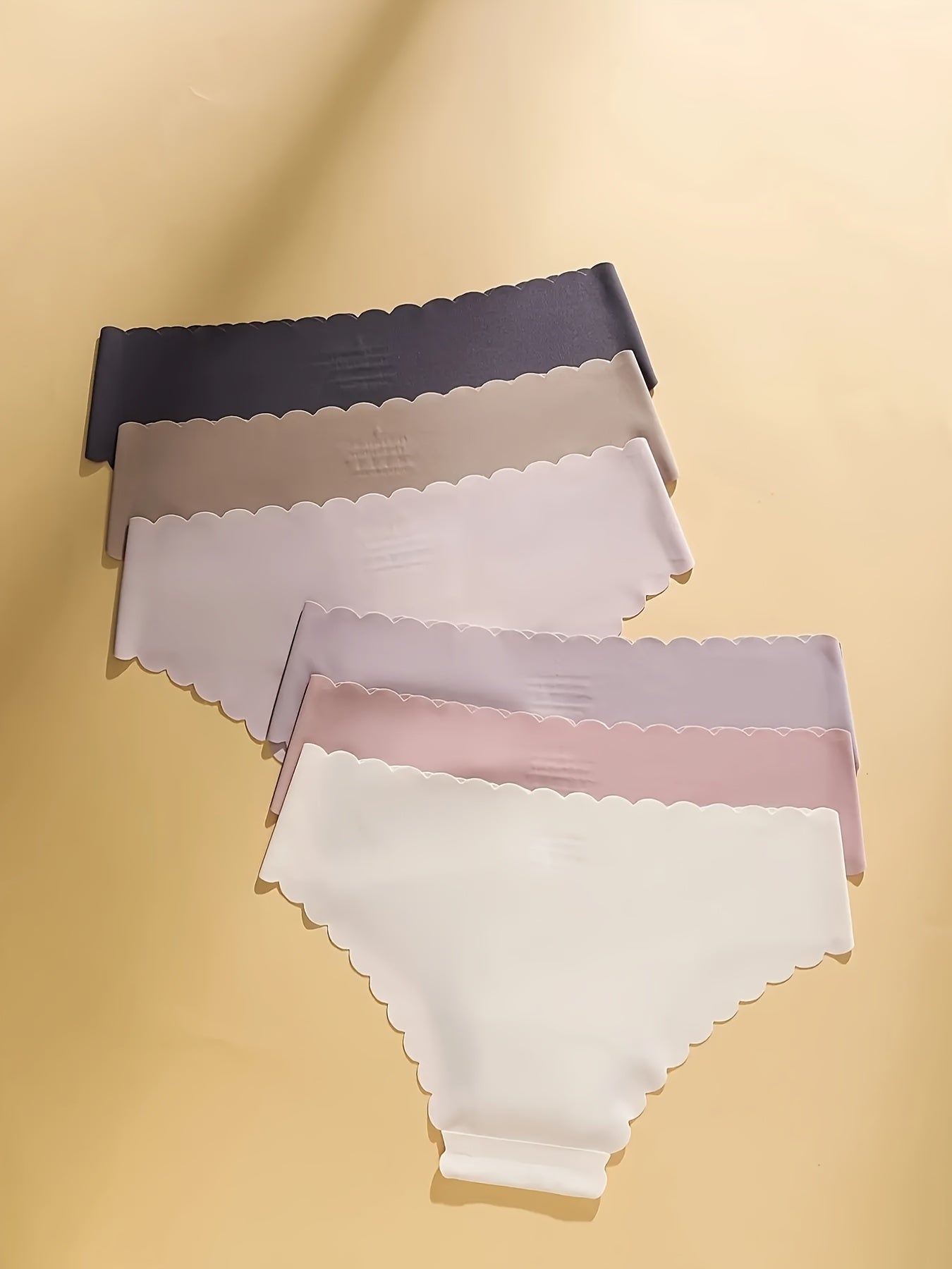 Women's seamless nylon briefs in solid colors with scallop edge, perfect for sports, yoga, dance, and casual wear.