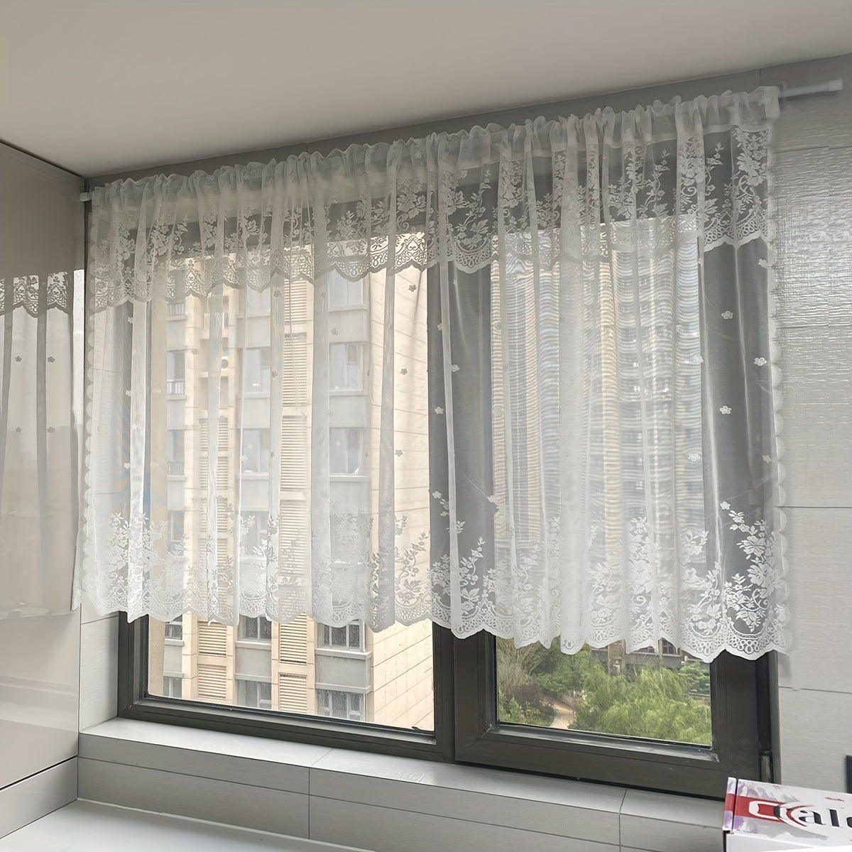 One piece of Romantic White Lace Curtain Panel, with adjustable length and machine washable. Featuring a delicate floral pattern, perfect for adding a touch of elegance to your bedroom, kitchen, or coffee shop decor.