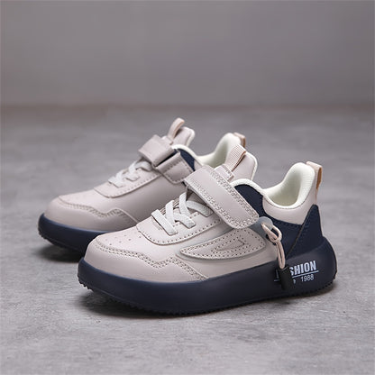 Youth sports shoes with casual style, hook-and-loop strap, breathable EVA sole, versatile for all seasons.