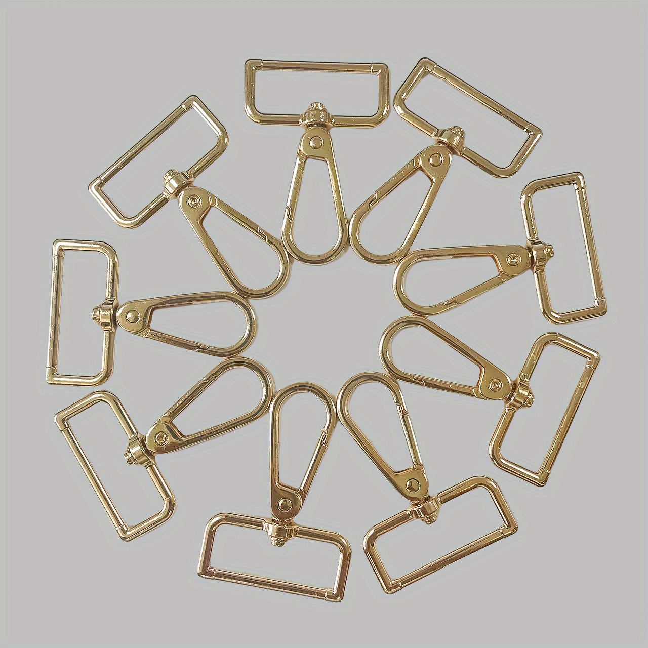 A set of 10 Gold-Tone Spring Hooks measuring 1.2" in length, featuring Thick Pads and 360° Rotation. Ideal for use with Handbag Straps and Jewelry Clasps.