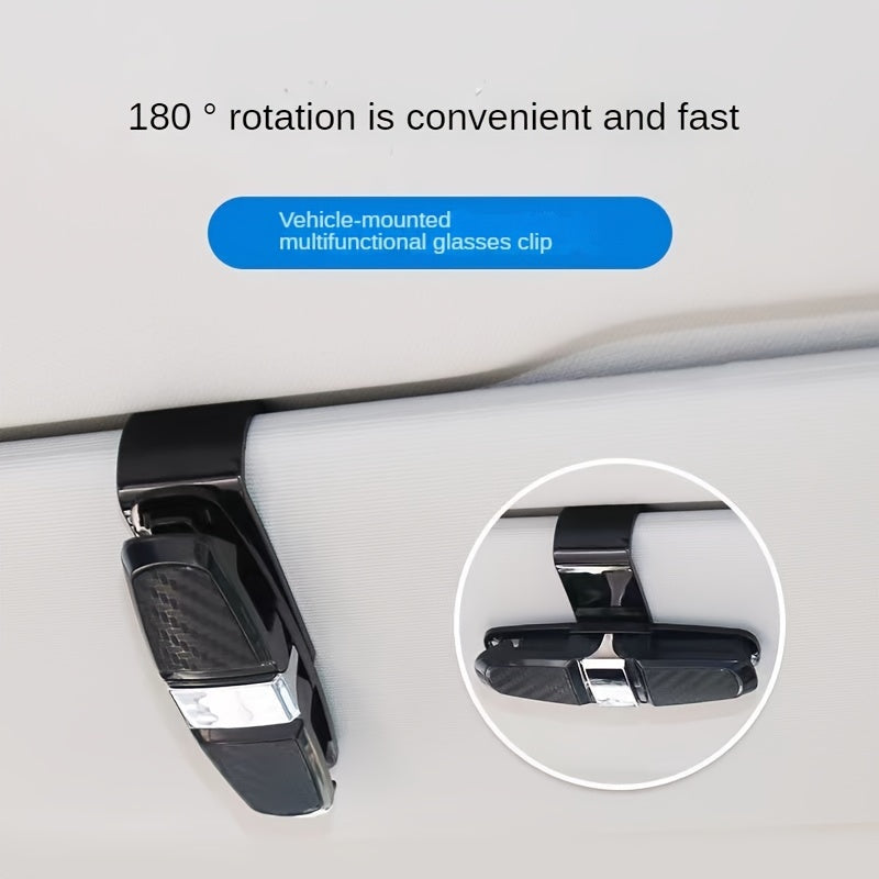 Car visor sunglasses holder with ticket card clamp.