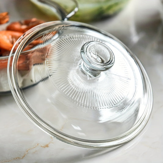 Glass casserole dish with lid designed for oven and microwave use. Dimensions: 28.09cm diameter, 21.11cm depth, with 11.0cm handles. Perfect for baking and cooking.