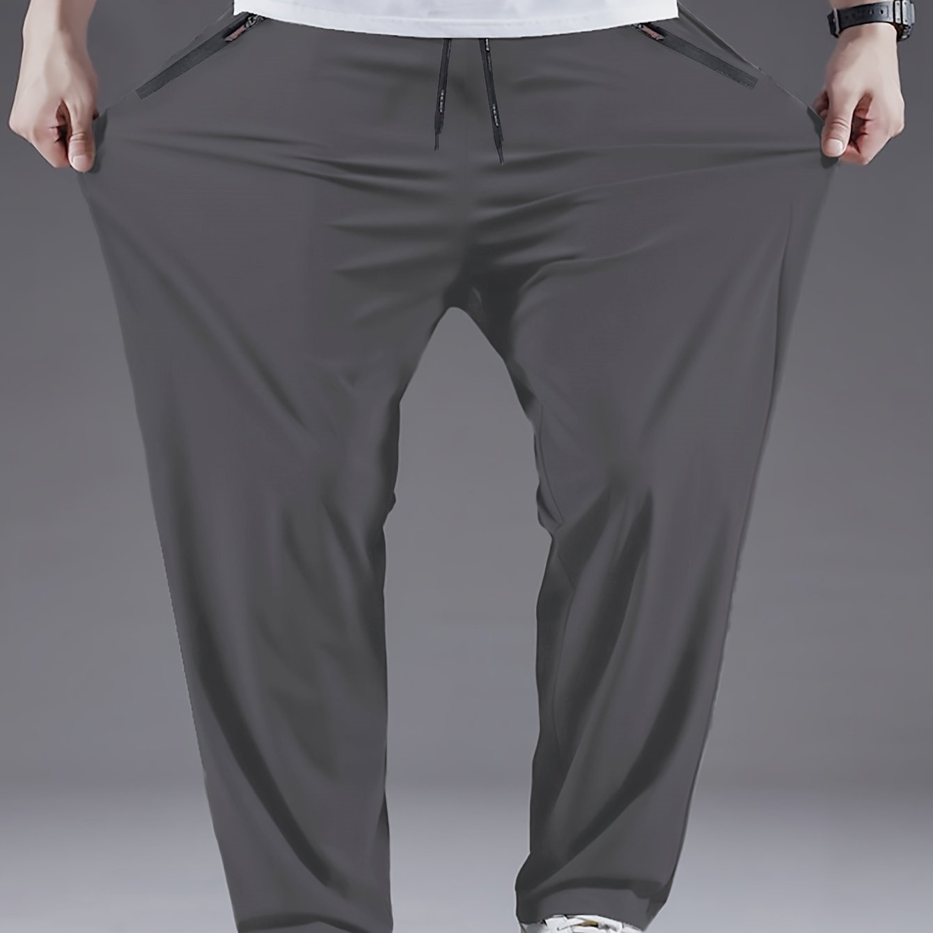 Men's plus size black polyester casual pants, lightweight, quick-dry, and breathable. Machine washable, suitable for sports and fitness. Plus size.