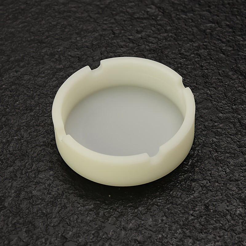 Round silicone ashtray for home or office use, suitable as a gift.