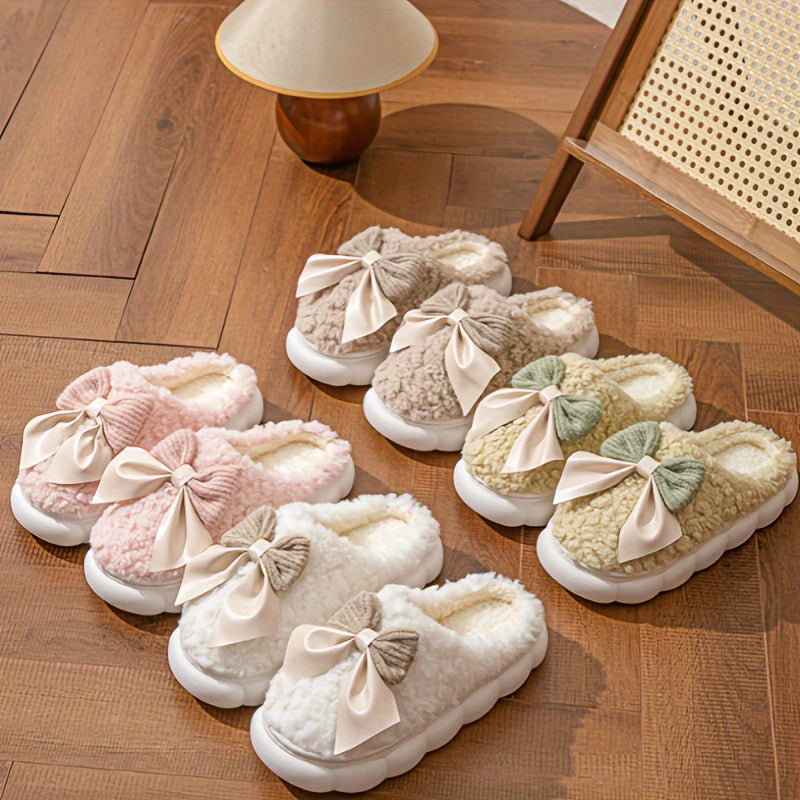 Women's winter warm plush slippers with bowknot detail and non-slip sole, perfect for autumn/winter indoor wear.