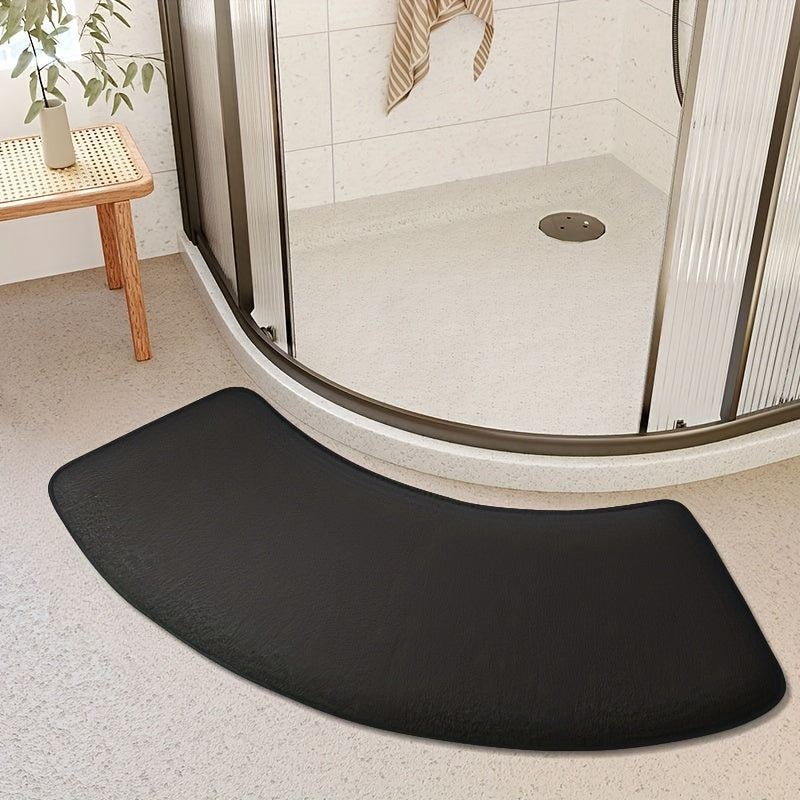 This non-slip bath mat is made of thickened polyester and designed for use as a shower door rug or entryway foot mat. It can be hand-washed and has a low pile, making it easy to clean. This machine-made mat weighs 660g per square meter and is 1.2cm