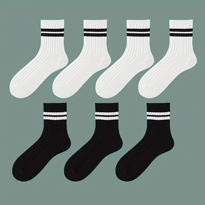 7 pairs of black and white thick mid-length socks for comfortable and breathable wear in autumn and winter.