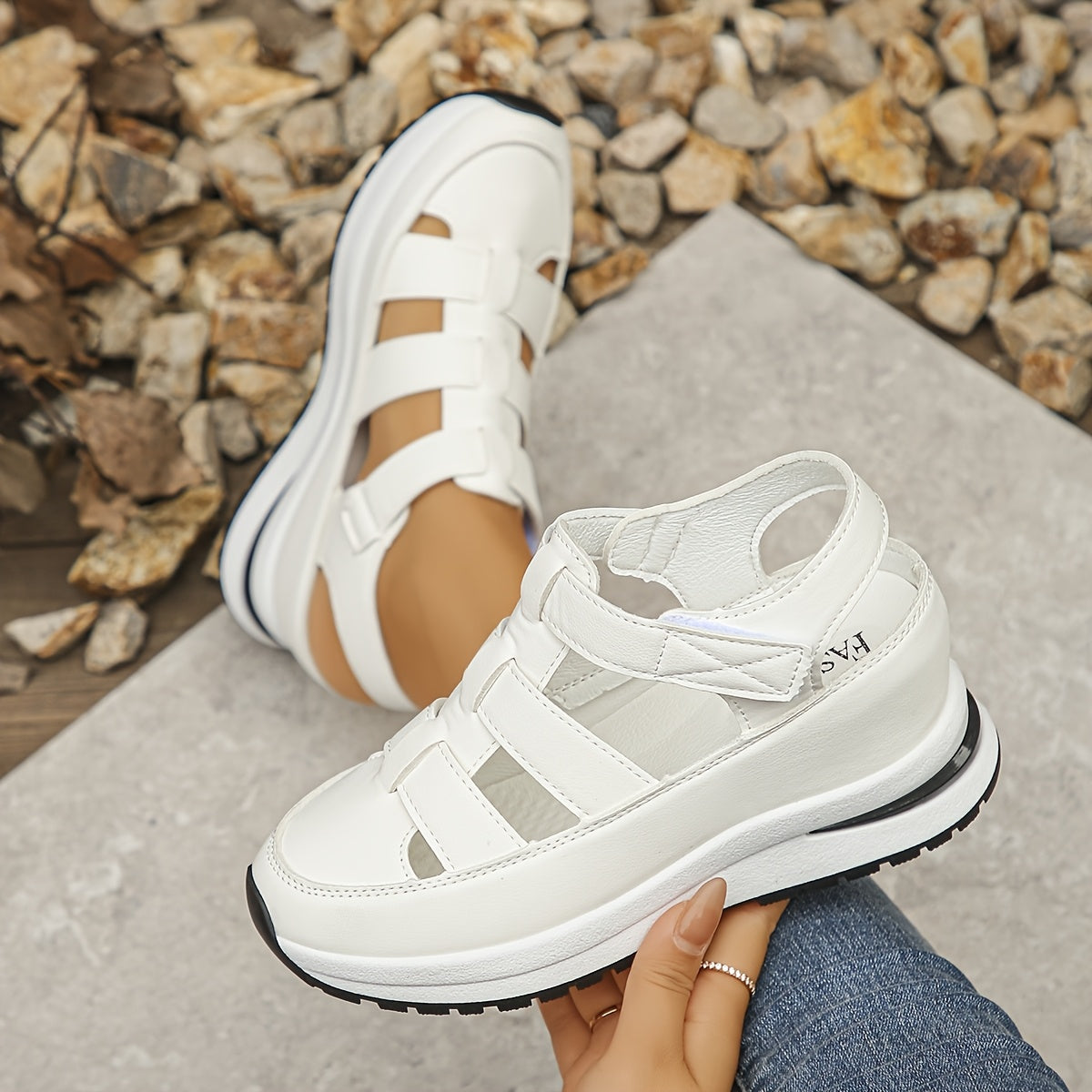 Stylish wedge sandals with hidden height, thick sole and hook-and-loop closure for comfort and versatility.