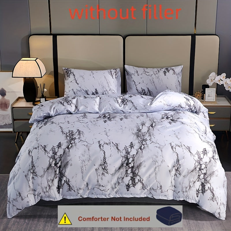 Elevate your bedroom or guest room decor with the 3-piece Elegant White Marble Print Duvet Cover Set. This set includes one soft polyester duvet cover and two pillowcases, all featuring a stylish white marble print. The breathable all-season bedding is