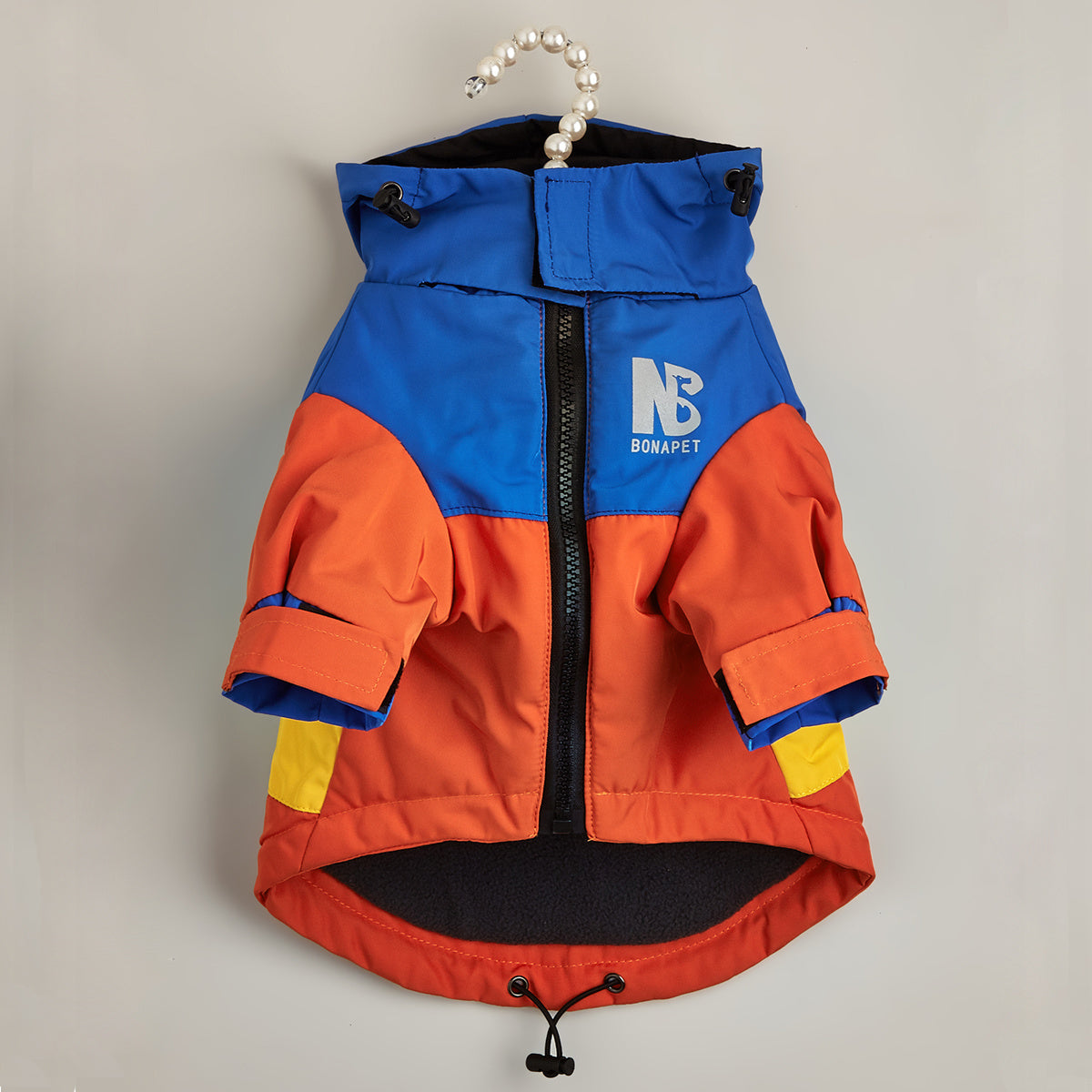 Reflective winter jacket for pets with color block design.