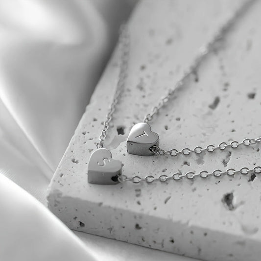 Stylish and chic, this Heart Initial Necklace is custom-made for girls. Crafted from durable stainless steel, it is perfect for any occasion, whether it be a casual day out or a fancy party. This makes a thoughtful gift for both friends and mothers