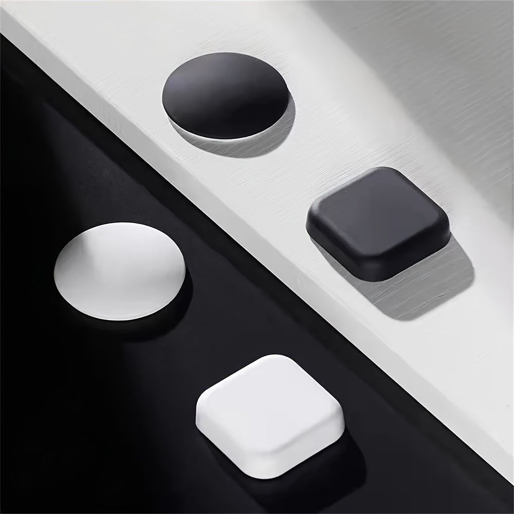 5 silicone door stopper pads in white, grey, and black for quiet, shockproof protection on doors and handles.