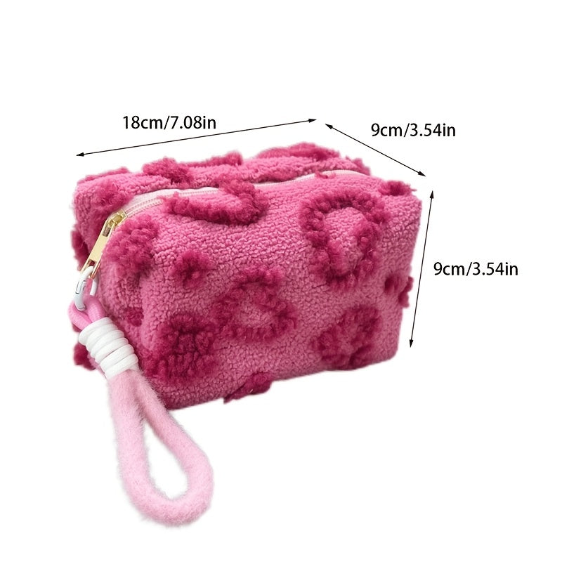 Heart-shaped hand carry bag for women, ideal for on-the-go skin care and cosmetic storage.