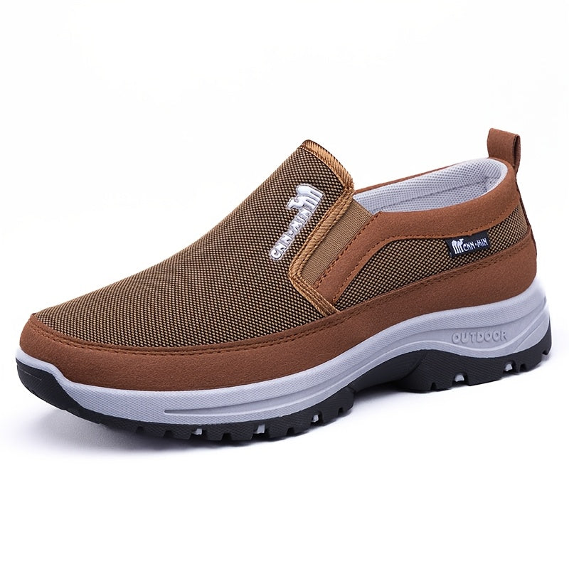 Men's slip-on sports sneakers with breathable fabric upper, round toe, and faux sole for daily wear and running.