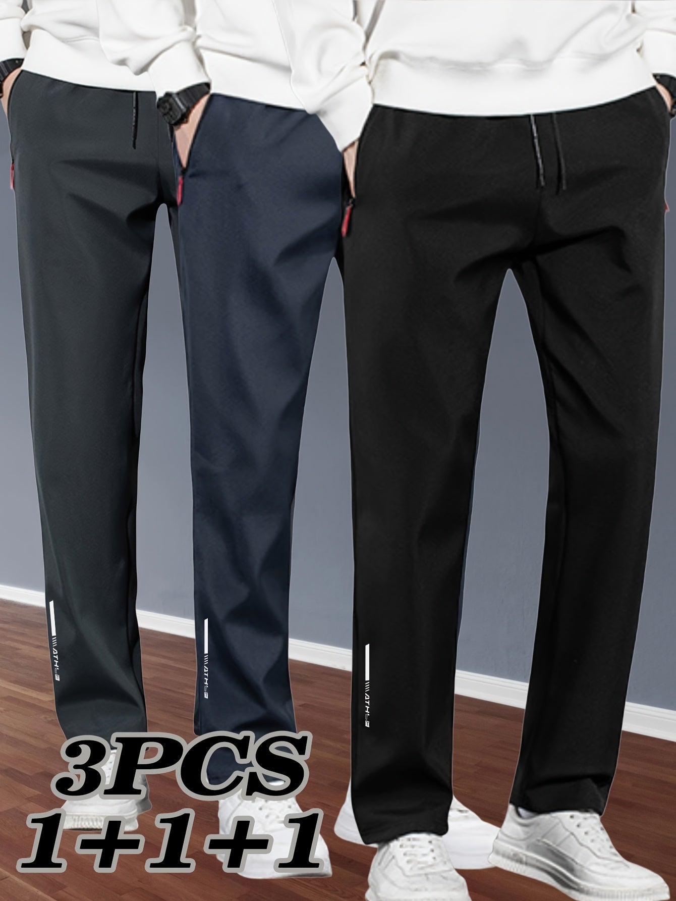 Three-pack of men's plus size track pants made of 100% polyester with a slight stretch, regular fit, woven fabric, print pattern, and zipper detail.