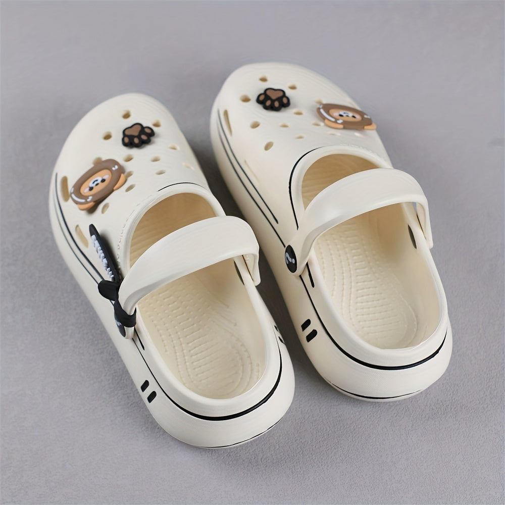 Durable outdoor slippers for boys featuring cartoon theme and comfy sole.