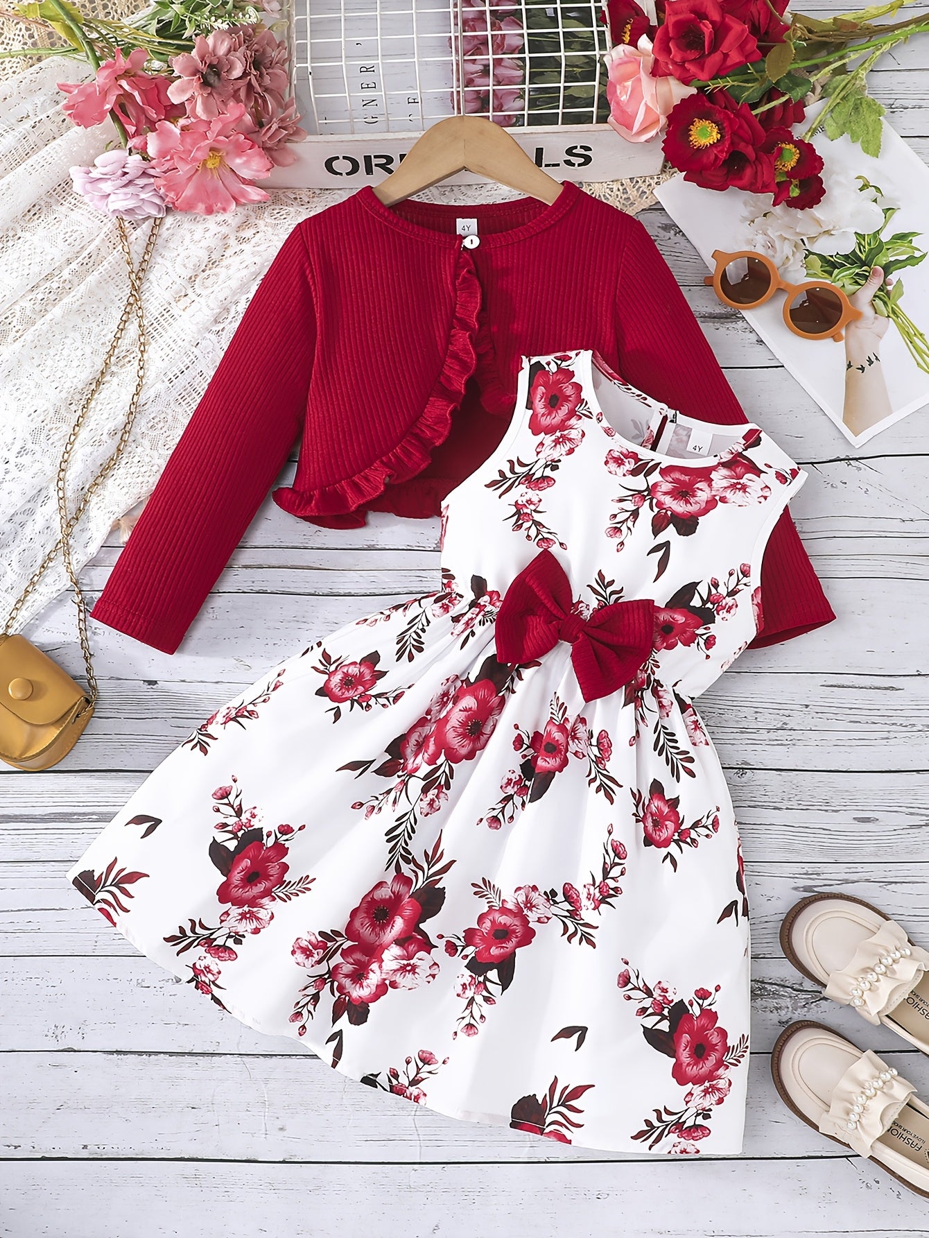 Girl's 2-piece outfit: Sundress with bow and floral pattern + Ruffle cardigan top. Casual wear for spring/fall, perfect for outdoor activities.