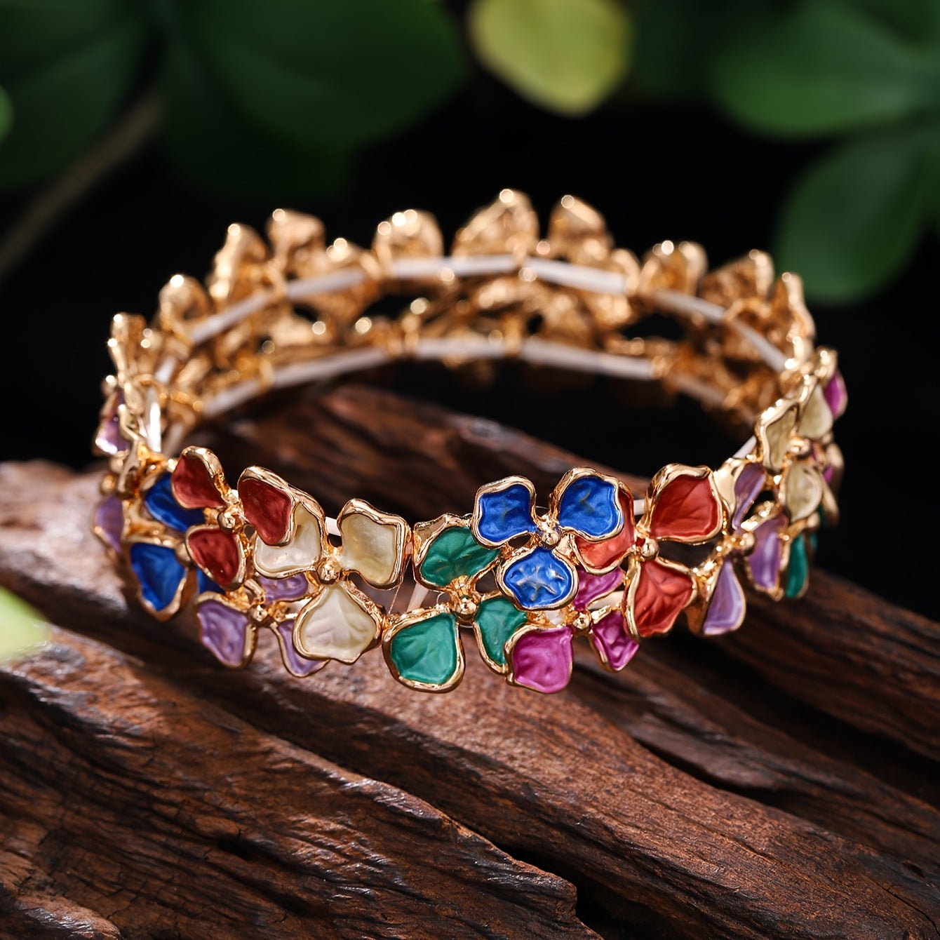 Elegant and timeless, this colorful enamel flower bracelet is made of high-quality zinc alloy. It is designed for women and features a fashionable stretch bangle style that is 18K golden plated. Perfect for daily wear, parties, and holidays, this