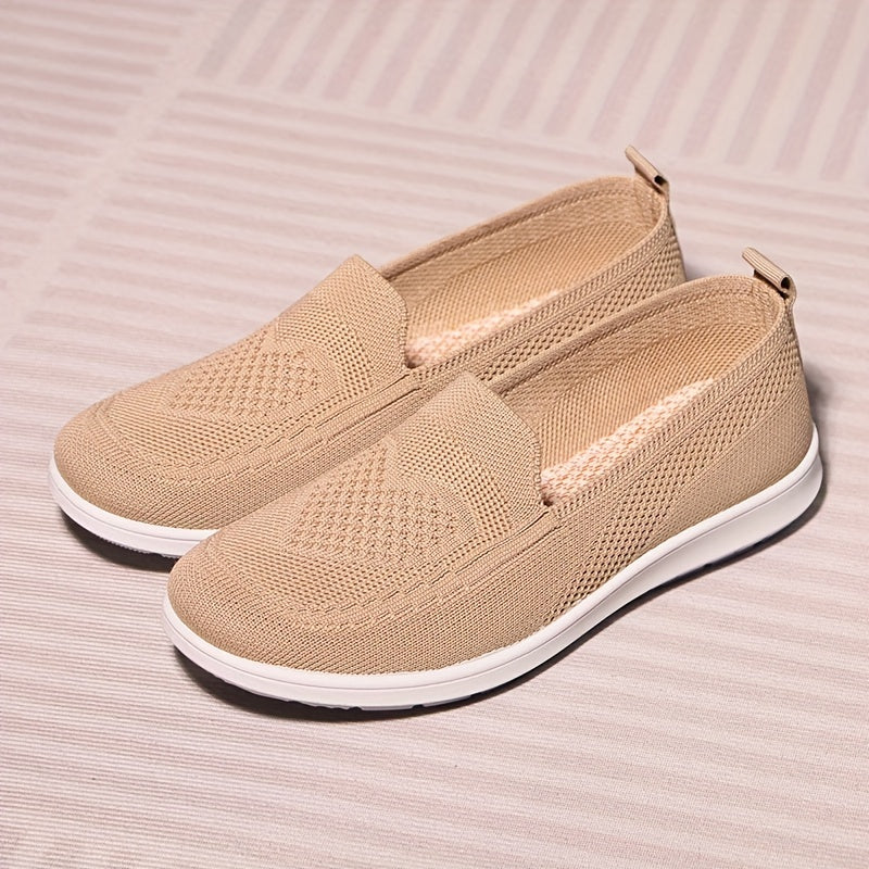 Women's slip-on flats with comfortable fabric upper, flax insole, and faux sole for easy daily wear.