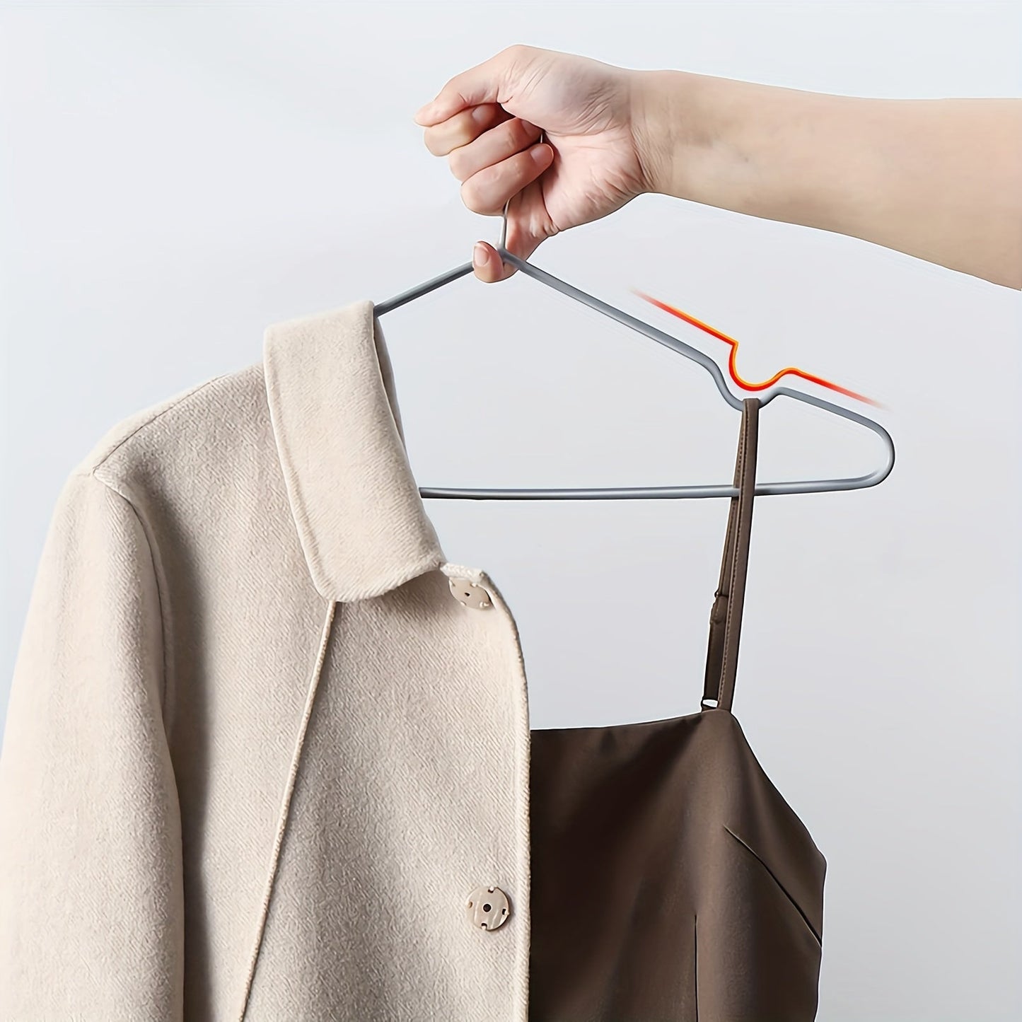 Get organized with this set of 30 heavy-duty non-slip metal coat hangers. Designed for efficiency and durability, these hangers are perfect for home or retail use. Save space and keep your clothes neatly organized with these sturdy hangers.