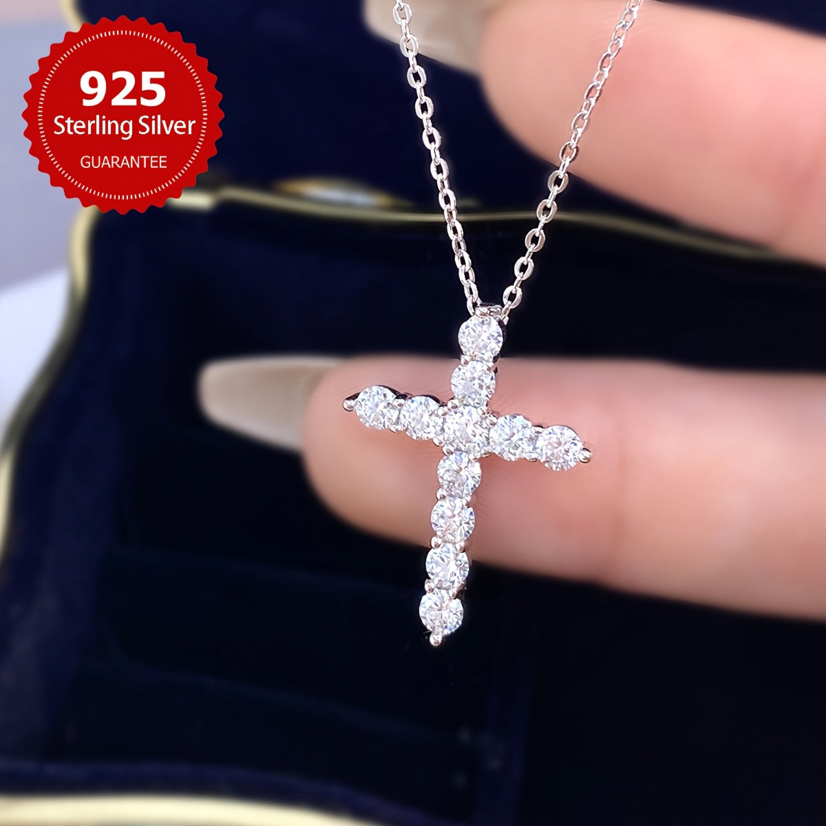 An exquisite Mozambique Diamond Cross Pendant Necklace, featuring a dazzling 1.1 carat diamond and 0.1ct * 11 Mozambique stones. Crafted from high-quality S925 Sterling Silver, this necklace weighs about 1.1 grams, making it a luxurious piece of jewelry